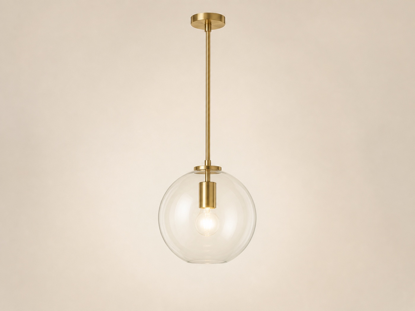 Glass pendant light on a light cream background